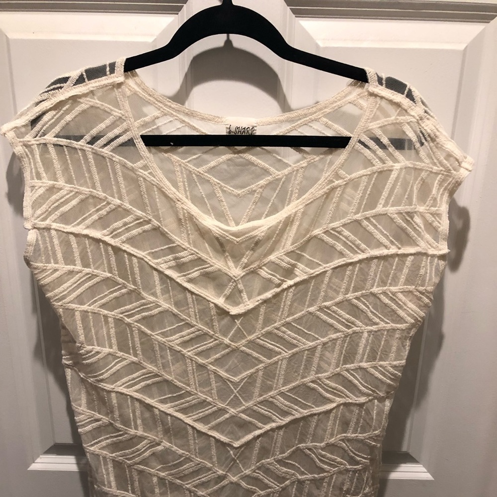 Sheer cream top